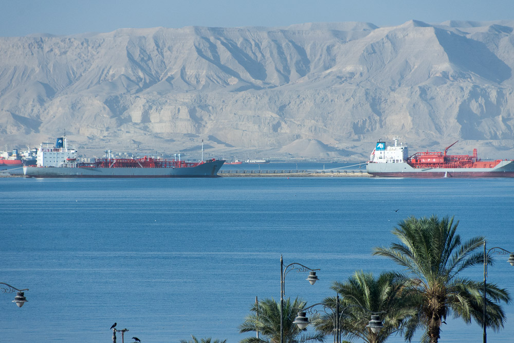 Ships lining up to enter the Suez Canal